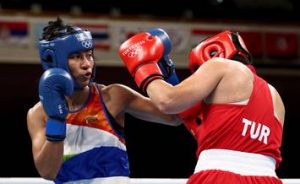 India’s sole boxer to be assured a medal at the Tokyo Olympics, Lovlina Borgohain put up a tough fight in her semi-final bout against reigning world champion and also the world number one Busenaz Surmeneli of Turkey, but eventually was beaten 5-0  Lovlina now finishes with a bronze in the women’s welterweight category. She is the third Indian boxer to win a medal at the Olympics after Vijender Singh and MC Mary Kom.  Her medal also helps India better their 2016 Rio Olympic Games tally with PV Sindhu winning a bronze and Mirabai Chanu clinching a silver in Tokyo.  Lovlina Borgohain was outplayed by the Turkish opponent and it was a unanimous decision in favour of the reigning world number one and world champion.  The Indian 23-year-old started off on a positive note with aggressive punches but Surmeneli was in the driver's seat after the first minute of the contest. The Turkish boxer landed some big punches and was awarded the round unanimously by all 5 judges. She’s was given 10s by all while Lovlina was awarded 9s.  In the second round, Lovlina was quick on the attack but Busenaz continued to be proactive in the ring. Both pugilists landed continuous punches but the Turkish boxer won the second round. Lovlina had five 9s from the judges, but got a deduction of one point for punching after the referee had closed the second round.  The final round saw Lovlina trying to bridge the gap with body punches. But Busenaz started to avoid her punches and landed a left hook followed by an uppercut. Lovlina punched non-stop till the end, but it was too late to make a turnaround against Busenaz's persistent attack  Surmeneli, the gold medal favourite, finished with perfect 10s in all rounds and will progress onto the final while Lovlina will also be on the podium, with a bronze.