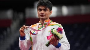 Suhas posing for the camera after the medal ceremony