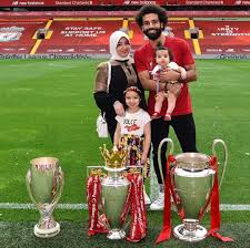Salah with his wife and kids