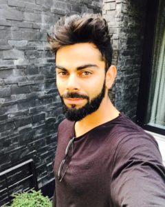 kohli Thick quiff with thick beard hairstyle