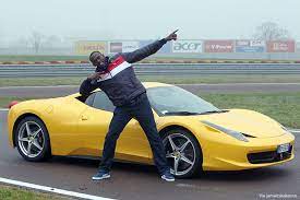 Usain Bolt with his car
