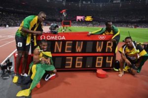 Usain Bolt with his teammates at 4*100m World Record