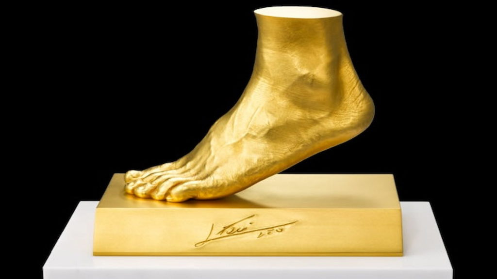 A solid gold replica of Mess's left foot