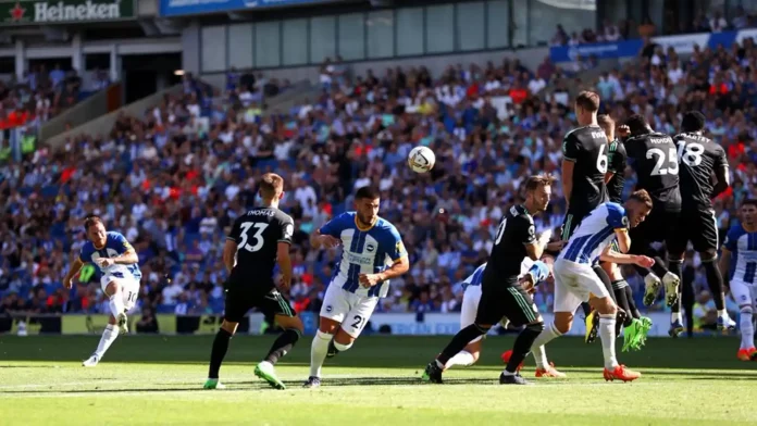 Alexis Mac Allister of Brighton sails the ball past the Leicester wall to complete the scoresheet