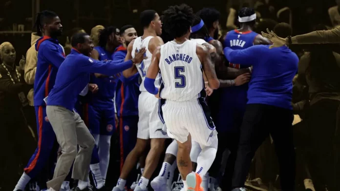 NBA suspends 11 players in connection with a fight between the Orlando Magic and the Detroit Pistons.
