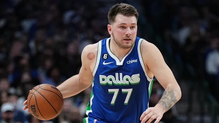 Luka Doncic leaves Mavericks-Suns game with a sprained left ankle.