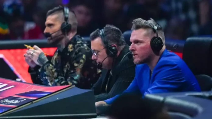 Corey Graves, Michael Cole and Pat McAfee