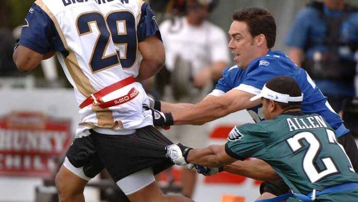 In an alumni air it out flag football game held on February 10 before the 2006 Pro Bowl in Honolulu, Jason Sehorn and Eric Allen teamed up to stop Eric Dickerson, as captured in a photograph by Al Messerschmidt/Getty Images.