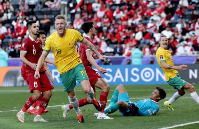 View image in fullscreen Harry Souttar adds a fourth in injury time Photograph: Lintao Zhang/Getty Images