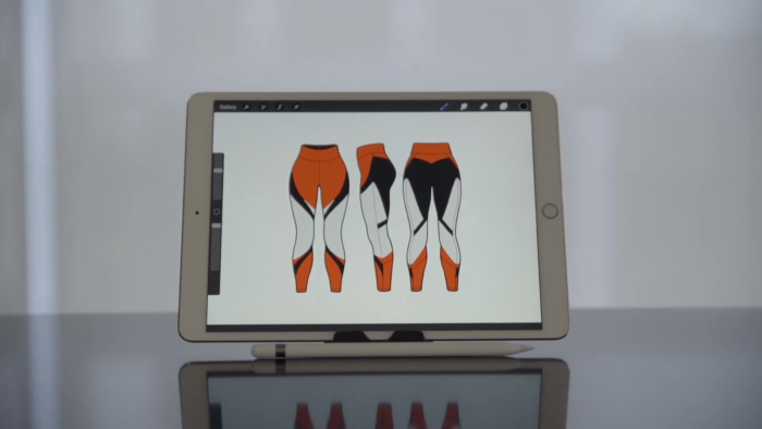 Digital Rendering of Three Variations of Athletic Leggings Displayed on A Tablet, Showcasing Different Color Schemes and Designs