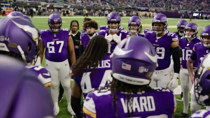 Josh Metellus motivates his teammates before the game begins