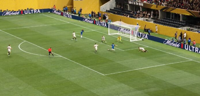 Chelsea`s forward breaks past defenders in a goal-scoring opportunity during a match