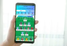 How to Pick the Best Starting Team in FPL for 2025/26: Complete Guide for New Managers A person playing Fantasy Premier League on a mobile phone